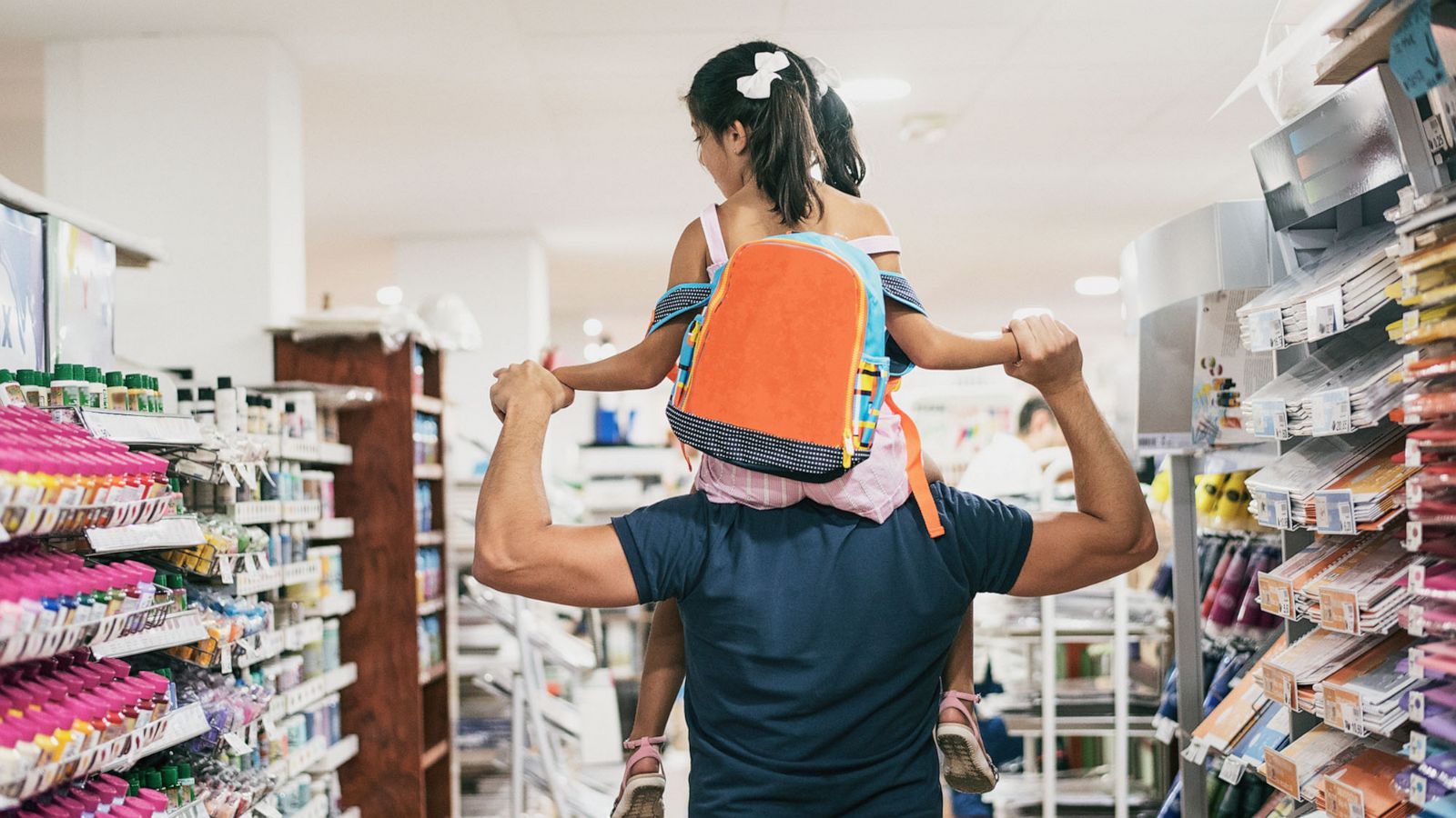 PHOTO: A father and daughter shop in the school supplies aisle of a store in an undated stock image.