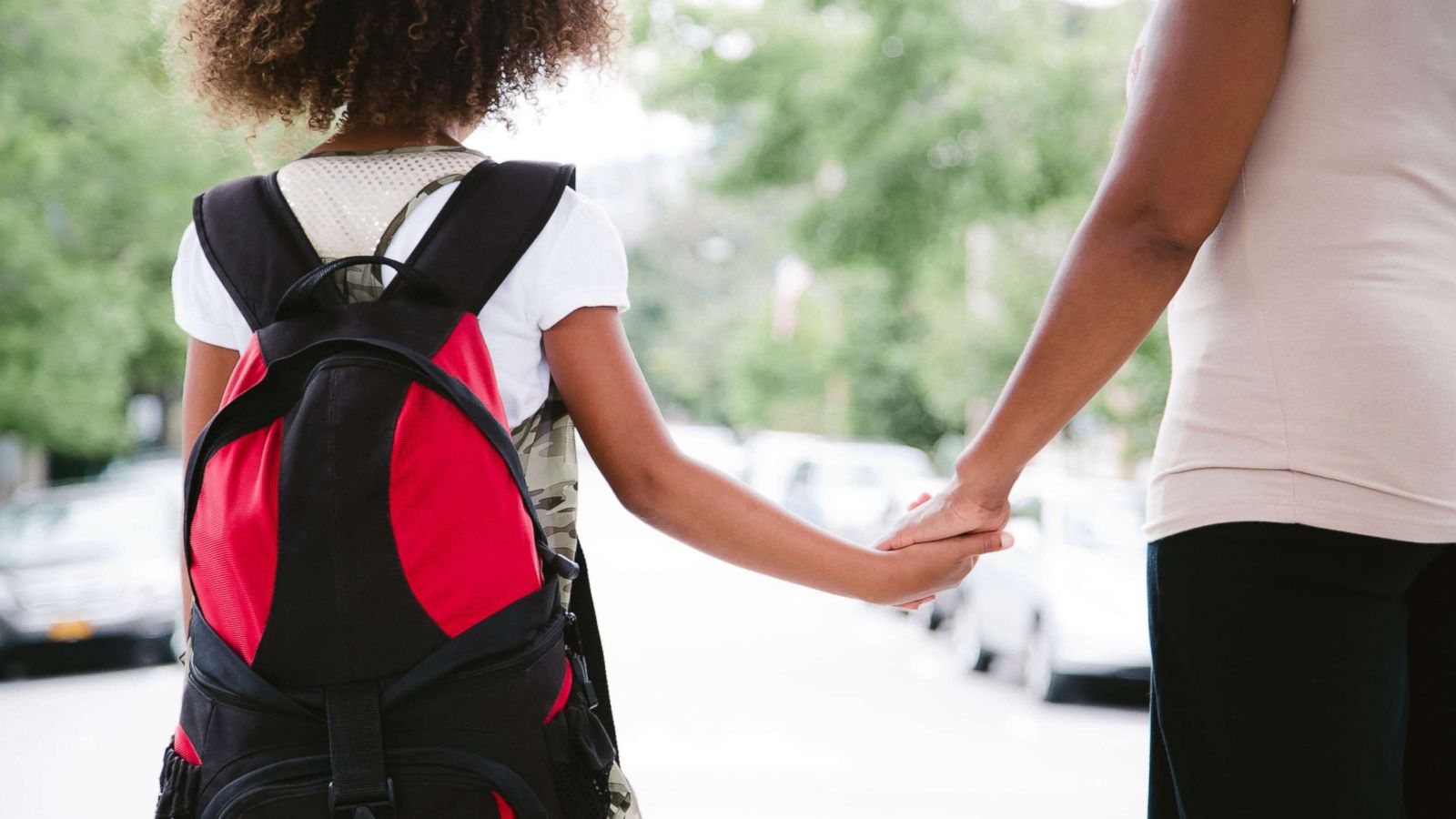 PHOTO: A mother and daughter hold hands while walking in this undated stock photo.