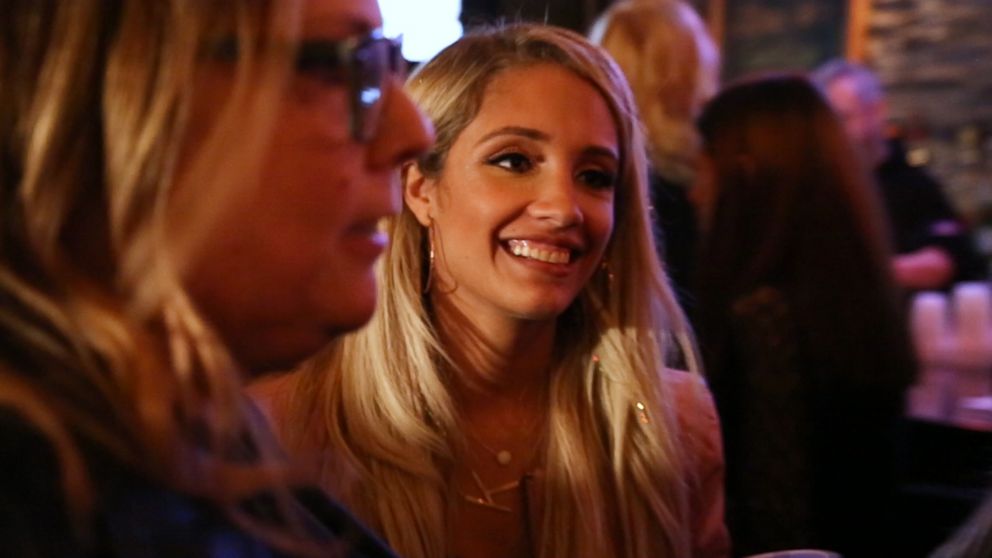 PHOTO: Krystale Romano of Long Island, New York, a group moderator and mother to one boy and three stepchildren, poses at Dark Horse Tavern in Rockville Centre, New York, on Feb. 16. during a "Bad Moms of Long Island" meetup. 