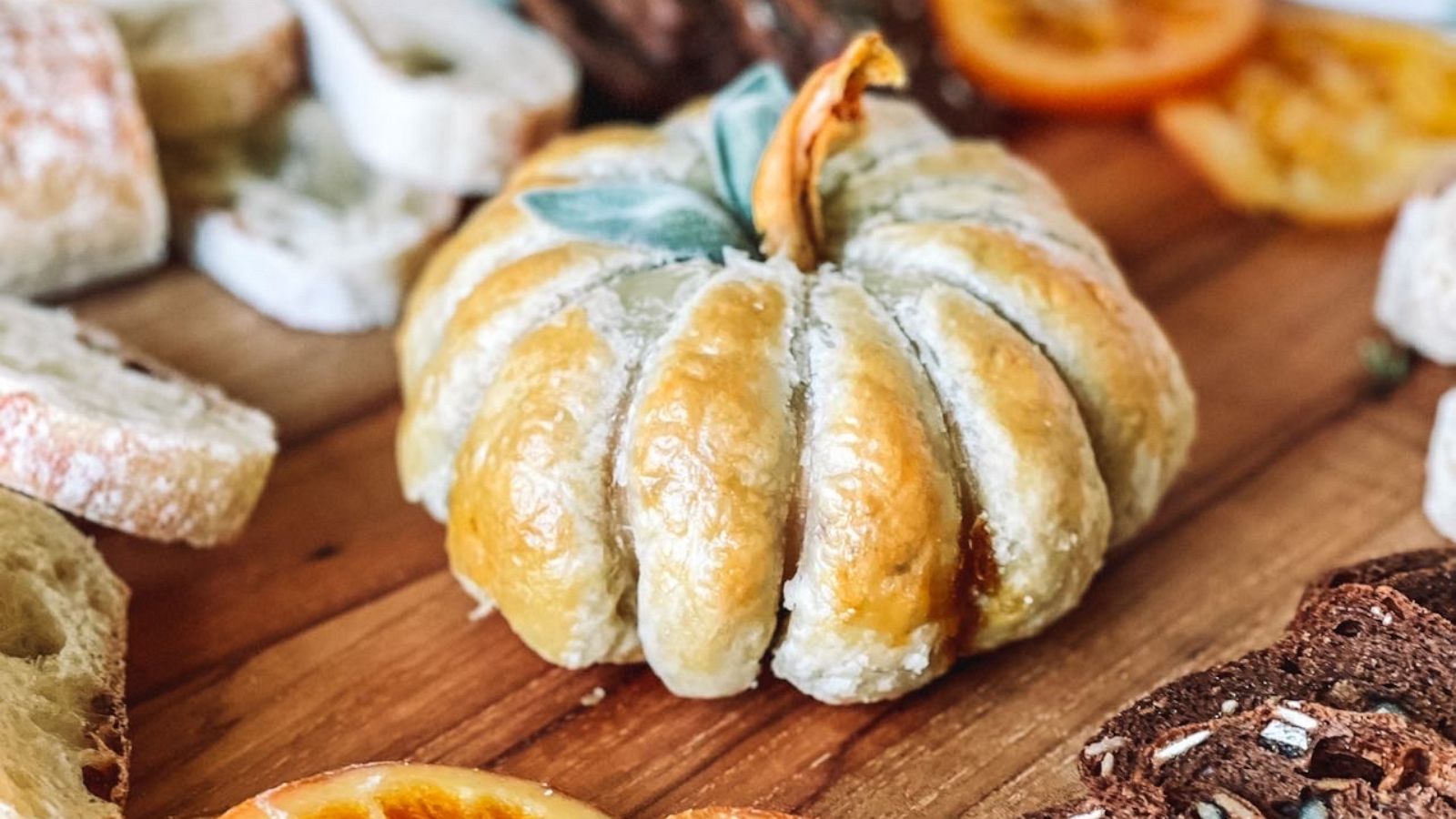 PHOTO: A baked brie en croute in the shape of a pumpkin.