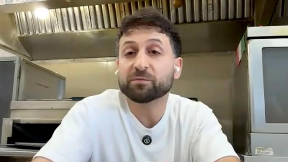 PHOTO: Nechirvan Zebari's children help him narrate social media videos that promote their family bakery, Alida’s Bakery in Everett, Washington.