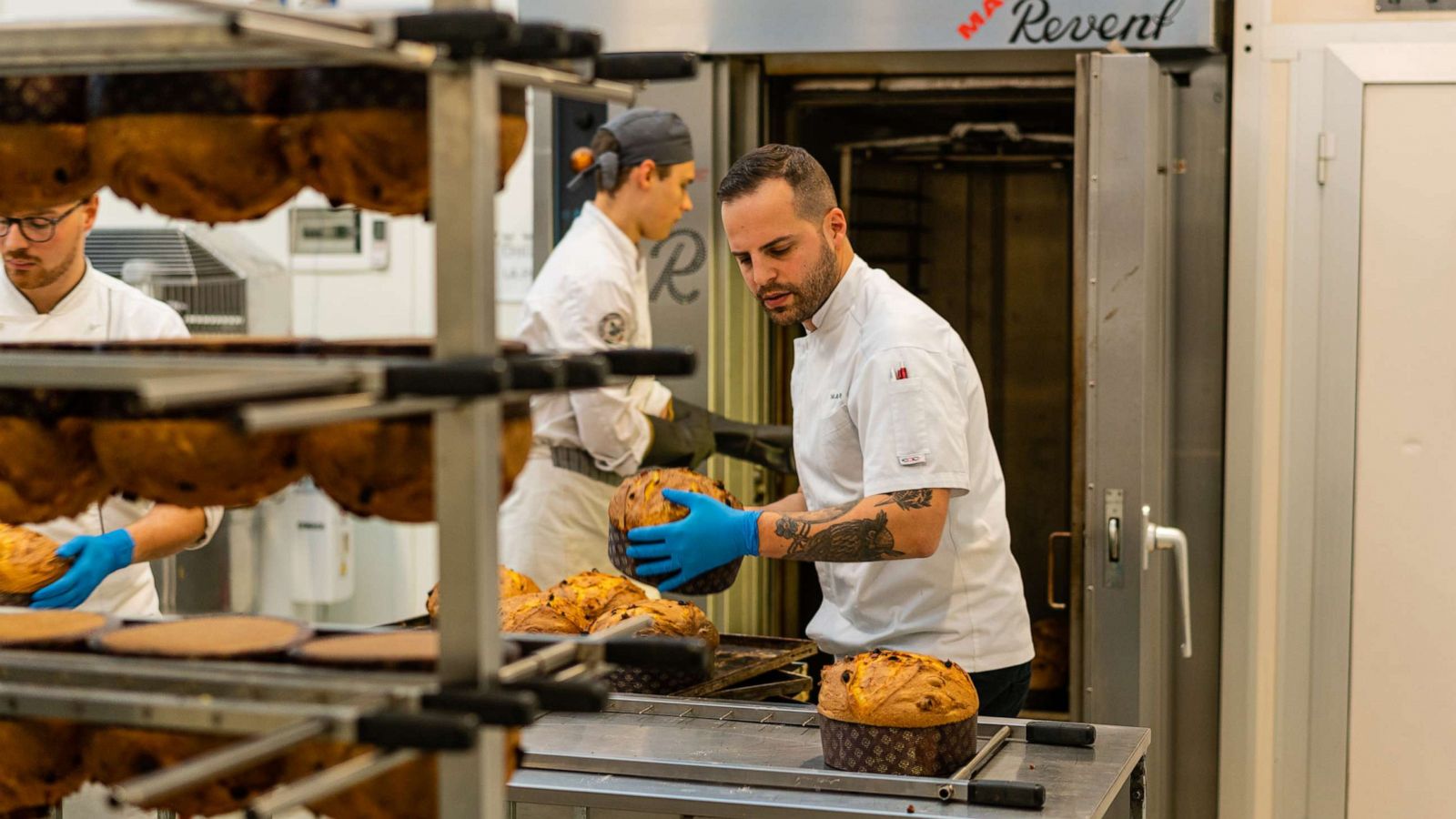 PHOTO: Nicola Olivieri holds a classic panettone inside his family-owned bakery.