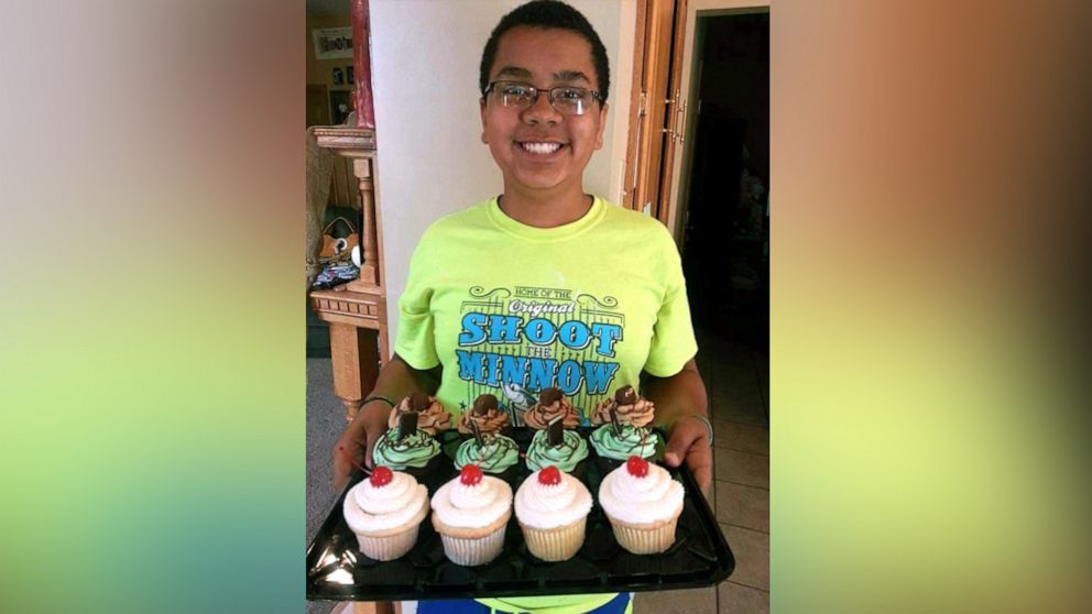 PHOTO: Isaiah Tuckett, 14, a 9th grader from Madison, Minnesota, bakes cupcakes for events in his hometown. 