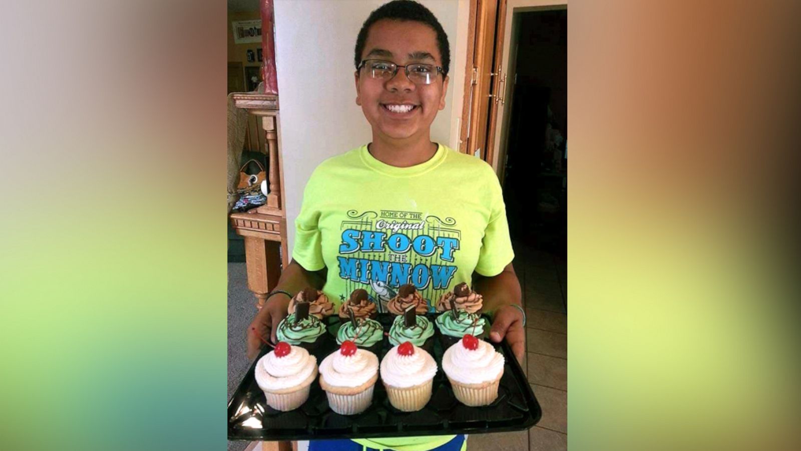 PHOTO: Isaiah Tuckett, 14, a 9th grader from Madison, Minnesota, bakes cupcakes for events in his hometown.