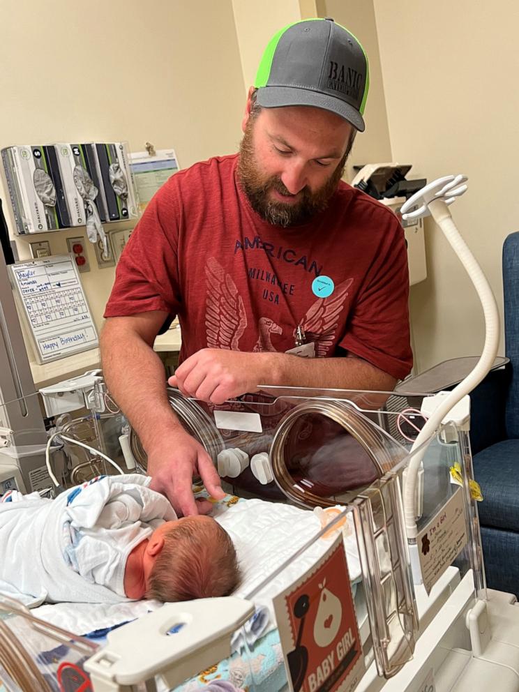 PHOTO: Derek Banic is pictured with his daughter Baylor in the NICU shortly after her birth on May 9, 2023.