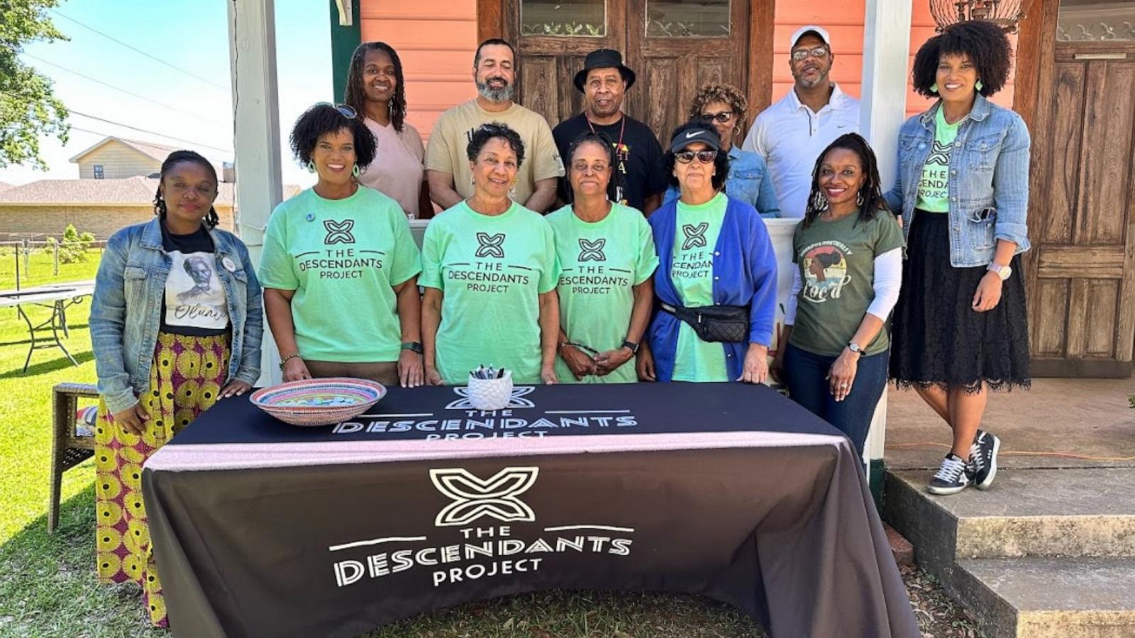 PHOTO: Jo and Joy Banner with their team at the Descendants Project.