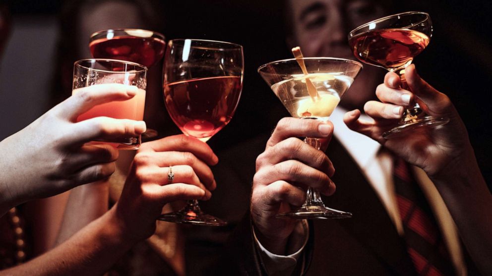 PHOTO: People raise their glasses in an undated stock photo.