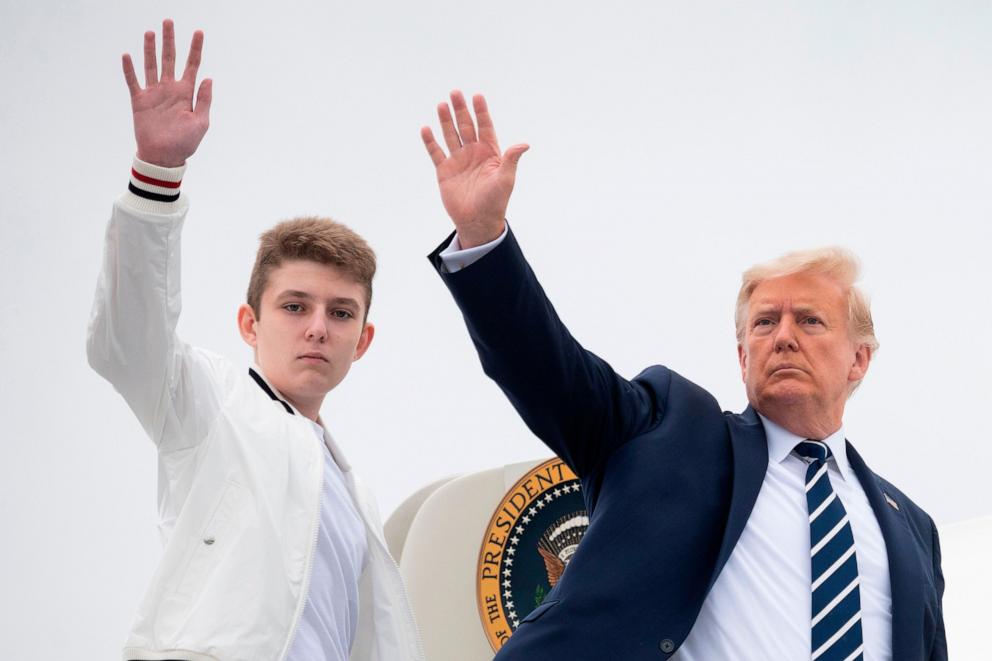 PHOTO: President Donald Trump and his son Barron wave as they board Air Force One at Morristown Municipal Airport in Morristown, N.J., Aug. 16, 2020. 