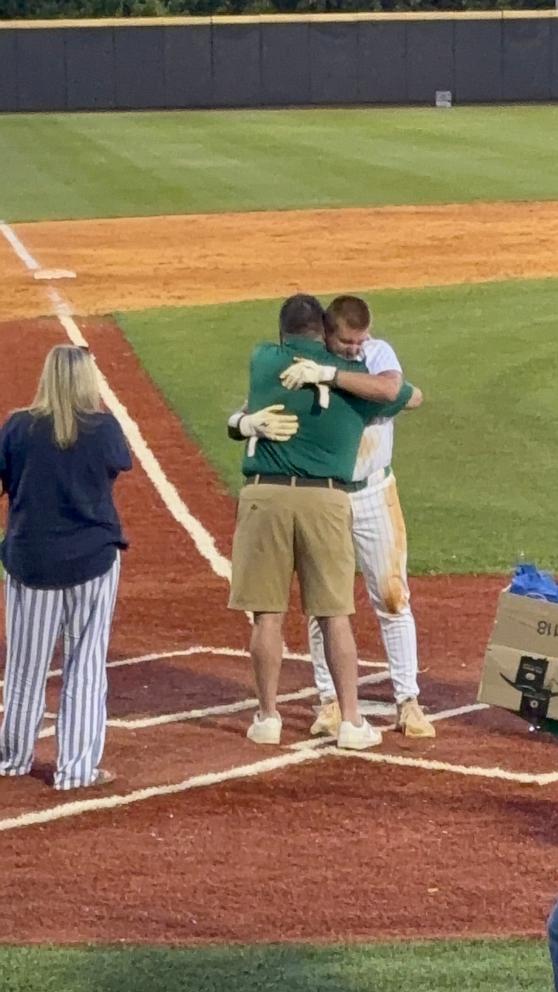 PHOTO: Will Bartnikowski and his parents are pictured at his final high school baseball team on May 5, 2025.