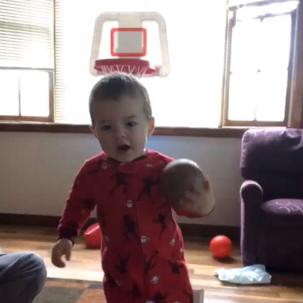 VIDEO: 2-year-old shoots baskets behind his head without breaking eye contact 
