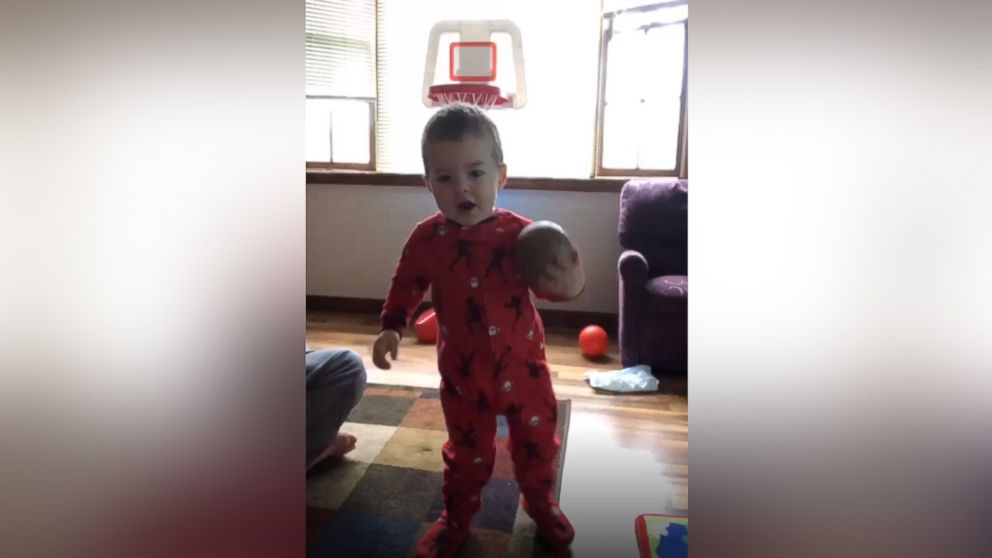 PHOTO: On five impressive occasions thus far, Elijah Bender, 2, has been caught on camera by his mother while shooting a basketball into a hoop without actually looking at the basket. 