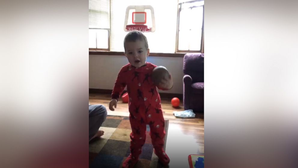 PHOTO: On five impressive occasions thus far, Elijah Bender, 2, has been caught on camera by his mother while shooting a basketball into a hoop without actually looking at the basket. 
