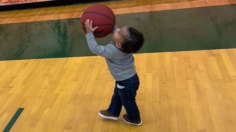 PHOTO: Aiden Webster attends practice for the Saint Leo University basketball team, for which his mom Ashley Webster is an assistant coach.