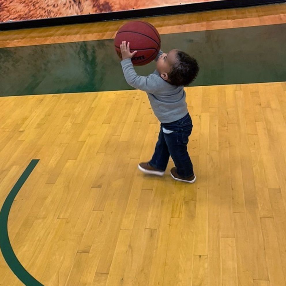 VIDEO: Basketball coach brings her newborn son to work every day for a year