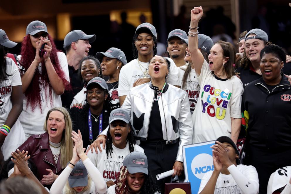 PHOTO: Head coach Dawn Staley of the South Carolina Gamecocks celebrates after beating the Iowa Hawkeyes in the 2024 NCAA Women's Basketball Tournament National Championship at Rocket Mortgage FieldHouse on April 7, 2024 in Cleveland.