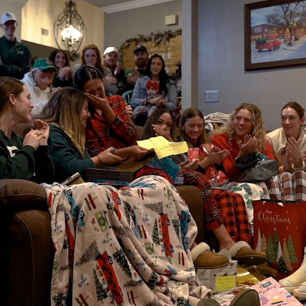VIDEO: College athlete surprised with full scholarship in gift exchange