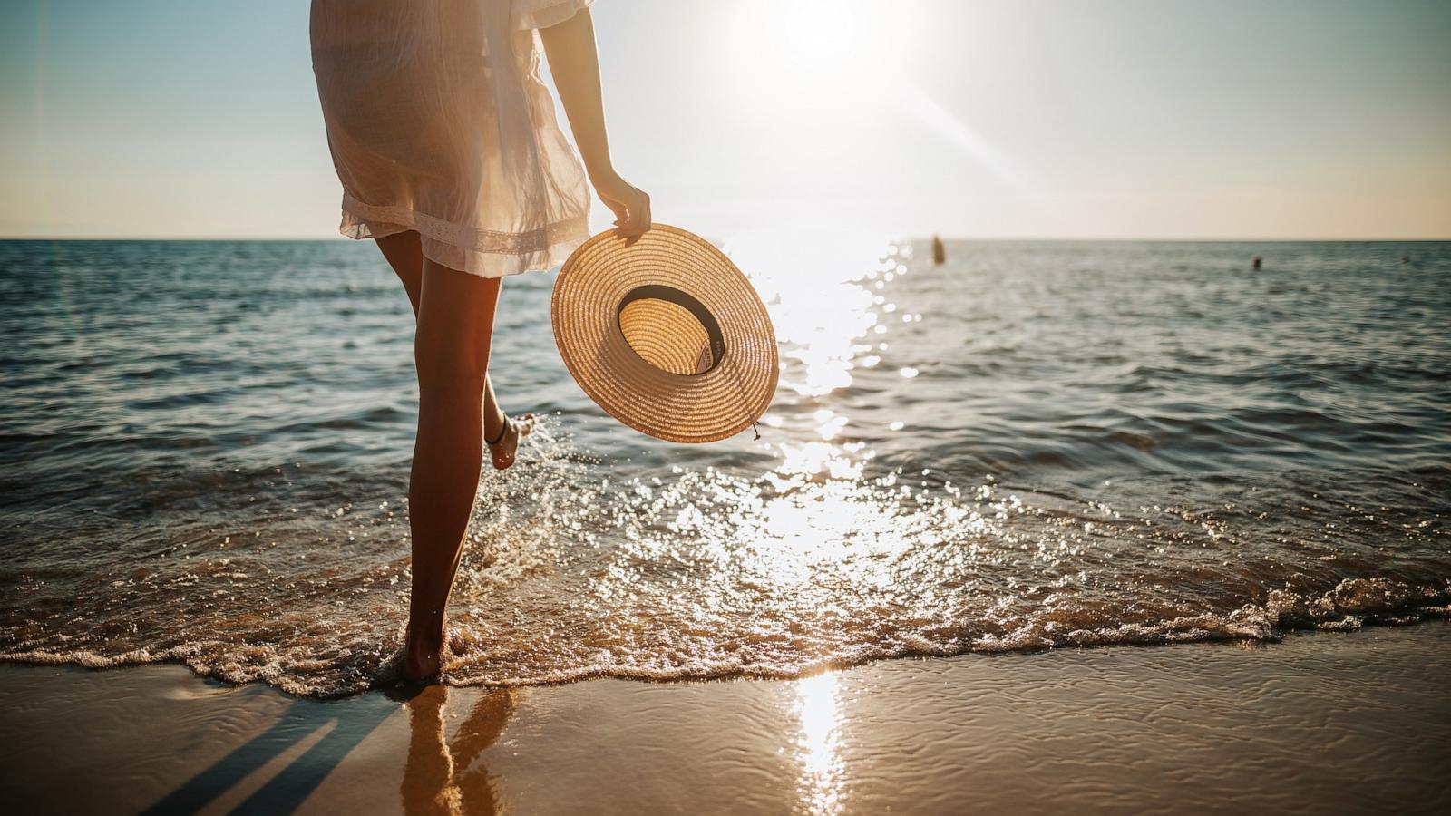 PHOTO: A woman walks on the beach in an undated stock photo.