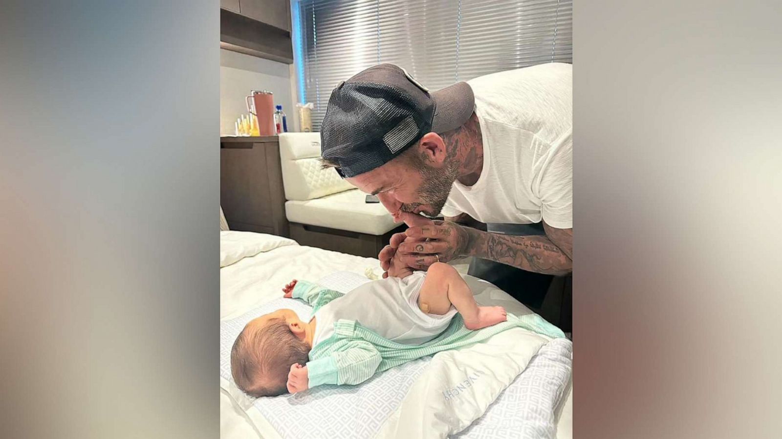 PHOTO: David Beckham meets Marc Anthony's newborn baby in a photo Anthony posted to social media, July 19, 2023.