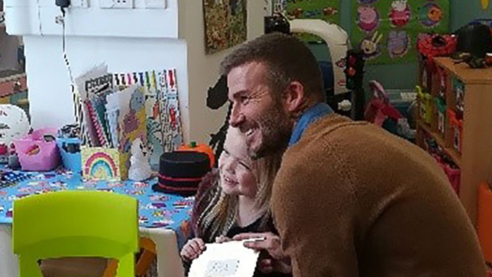 PHOTO: David Beckham recently surprised a young fan in a hospital in London. Beckham told Ella Chadwick that she was the winner of the Child of Courage award.