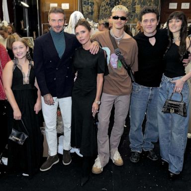 PHOTO: Left to right, Cruz Beckham, Harper Beckham, David Beckham, Victoria Beckham, Romeo Beckham,  Brooklyn Beckham and Nicola Peltz Beckham attend the Victoria Beckham Spring/Summer 2023 Runway show in Val-de-Grace on Sept. 30, 2022 in Paris.