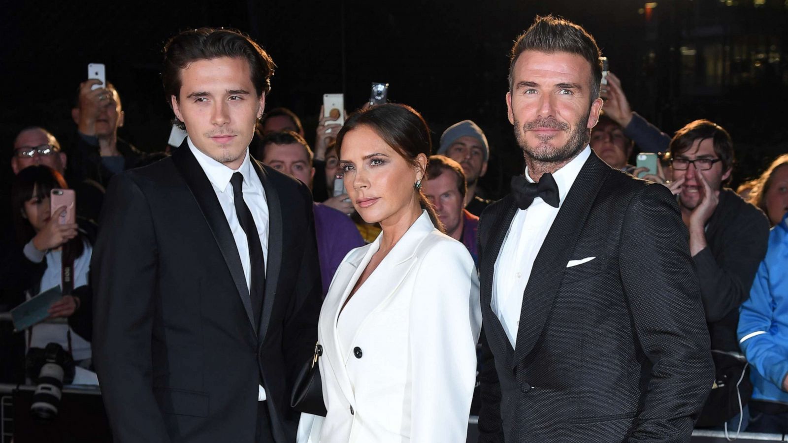 PHOTO: Brooklyn Beckham, Victoria Beckham and David Beckham attend the GQ Men Of The Year Awards 2019 at Tate Modern, Sept. 3, 2019, in London.