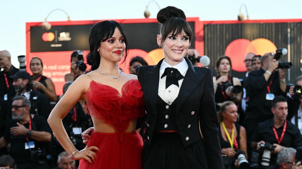 PHOTO: Jenna Ortega, left, and Winona Ryder attend the red carpet of the opening film "Beetlejuice Beetlejuice" presented out of competition during the 81st International Venice Film Festival, Aug. 28, 2024, in Venice. 