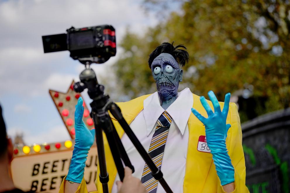 PHOTO: A Beetlejuice fan dressed as Bob the Shrinker ahead of the UK premiere of "Beetlejuice Beetlejuice" at Cineworld Leicester Square, London, Aug. 29, 2024.