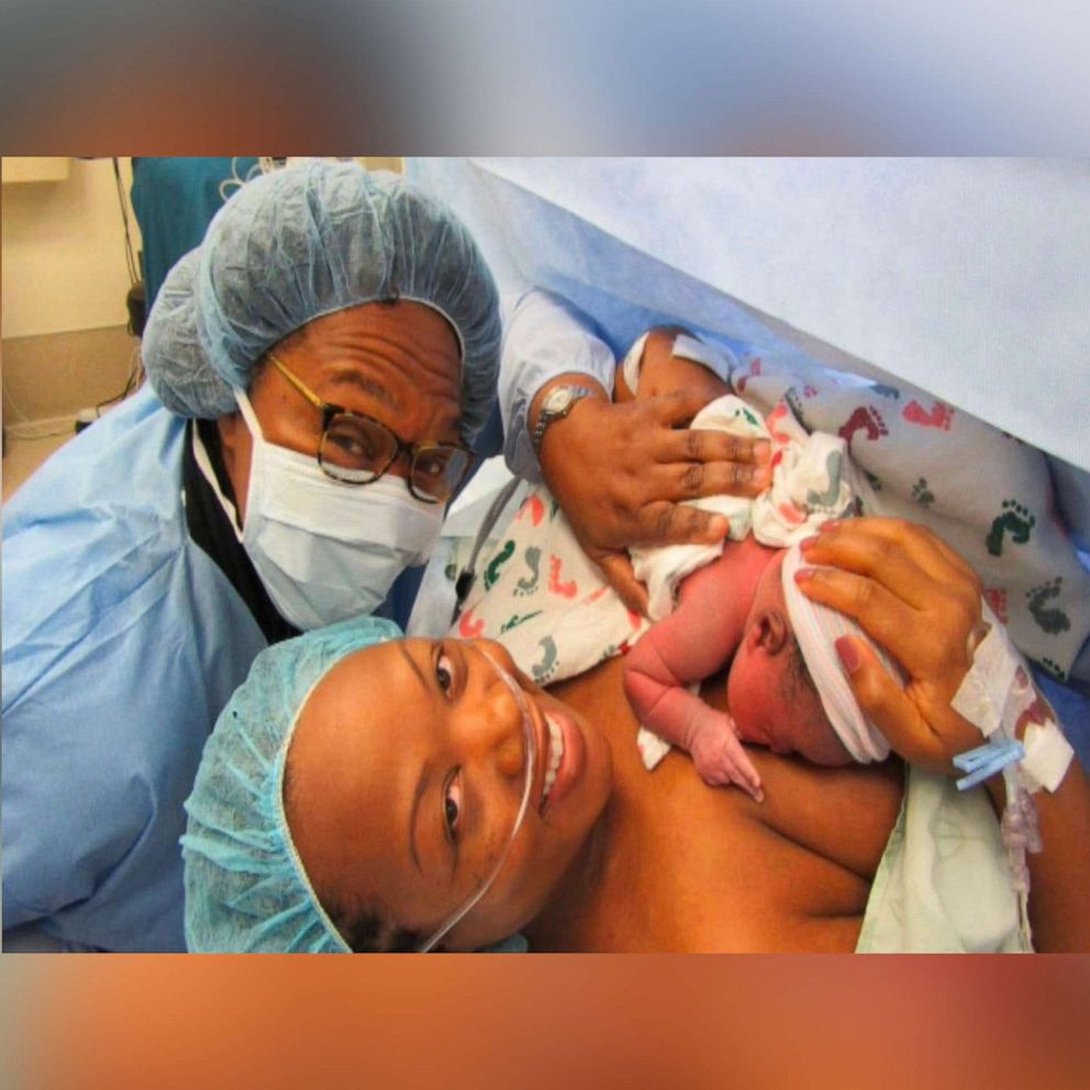 african american newborn baby girl in hospital