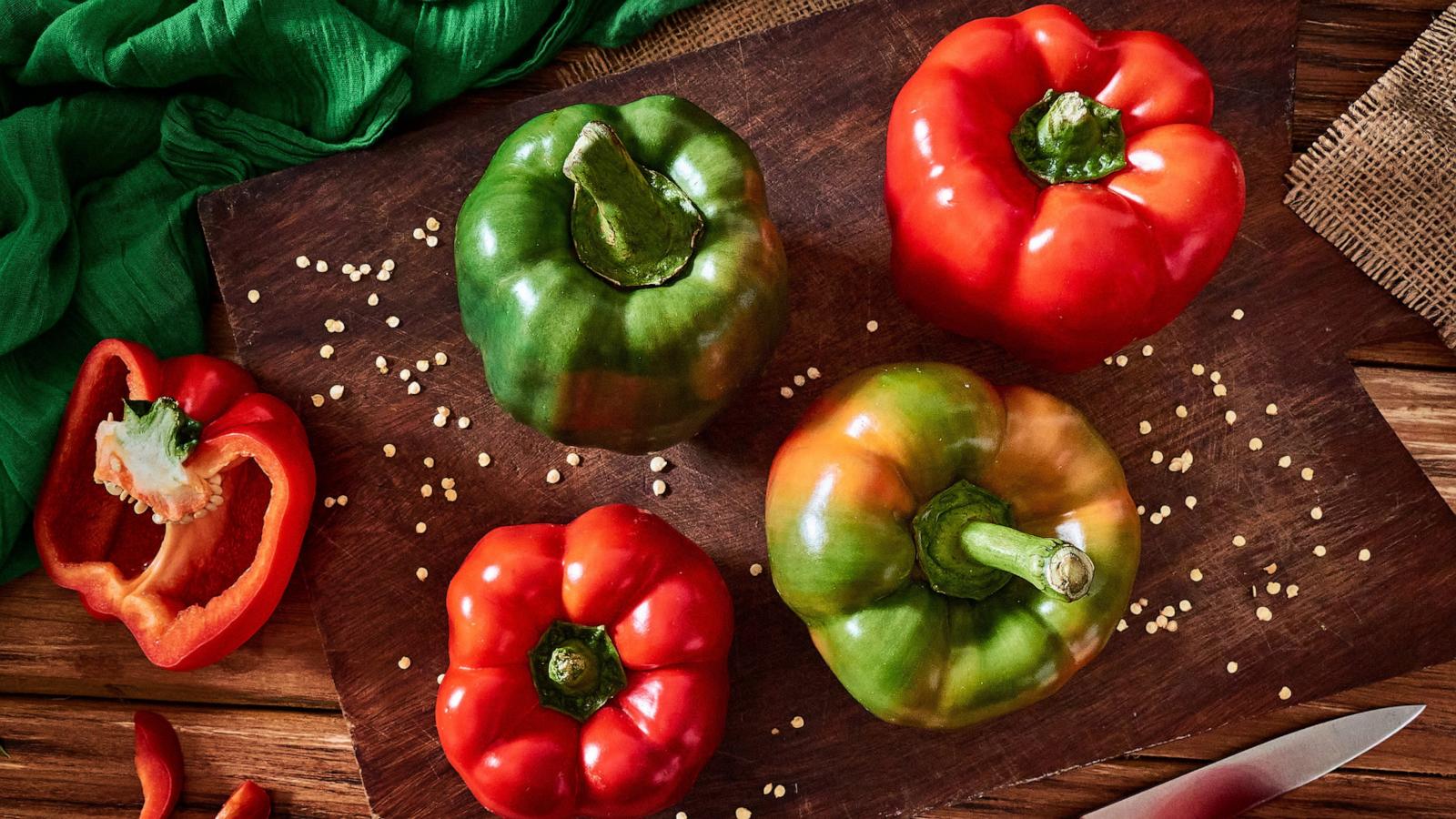 PHOTO: Fresh red and green sweet pepper on a cutting board