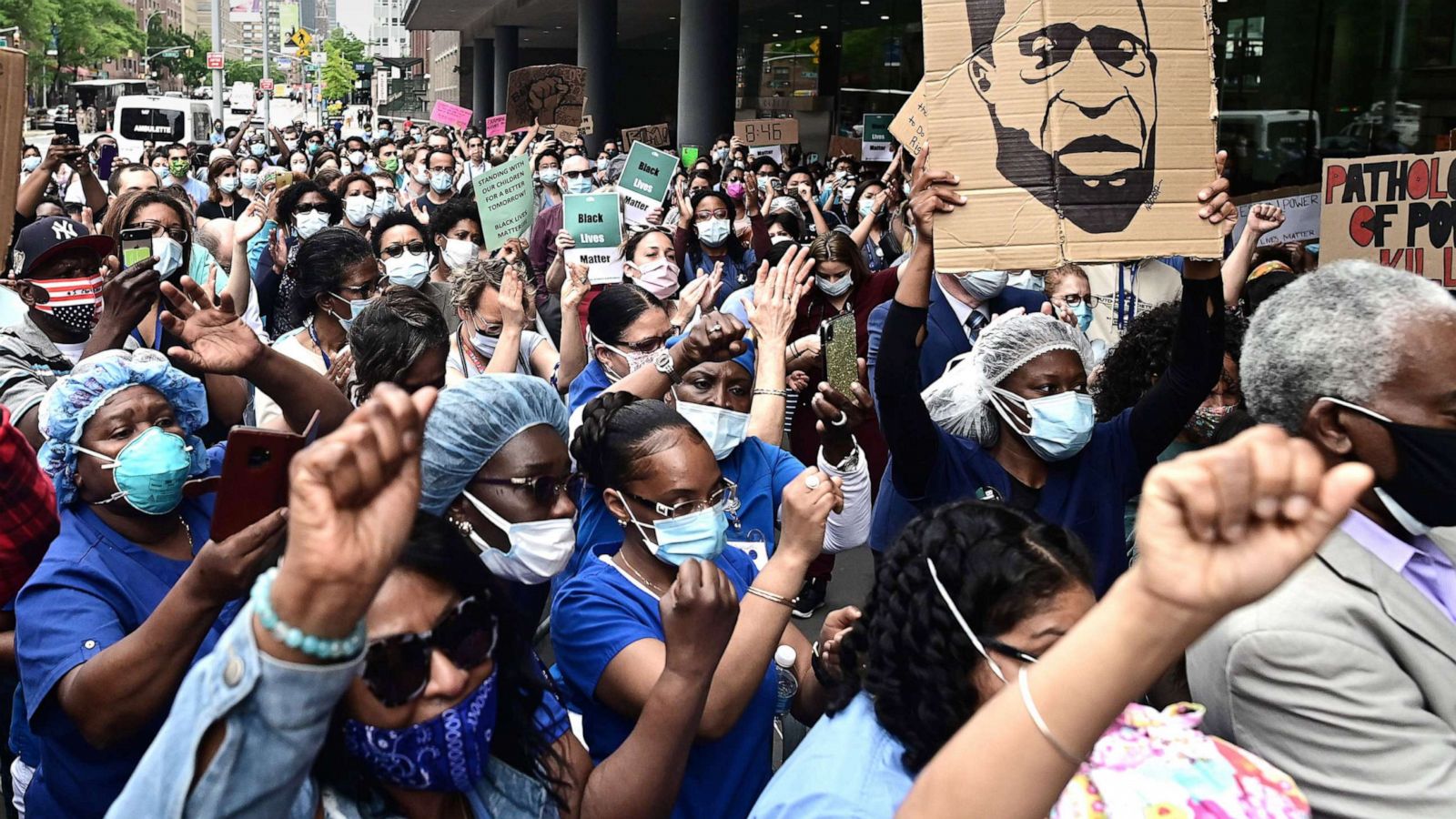 PHOTO: Nurses and healthcare workers attend a Black Lives Matter rally in front of Bellevue Hospital, June 4, 2020, in New York City.