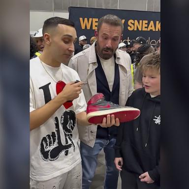 PHOTO: Ben Affleck appeared shocked when his son Samuel checked out a pair of $6,000 sneakers at a sneaker convention in Los Angeles on March 1.