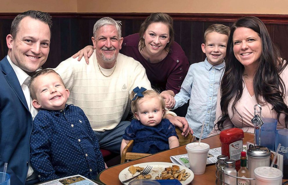 PHOTO: Transplant recipient David Bennett, Sr., center in white, poses with family members in a 2019 photo.