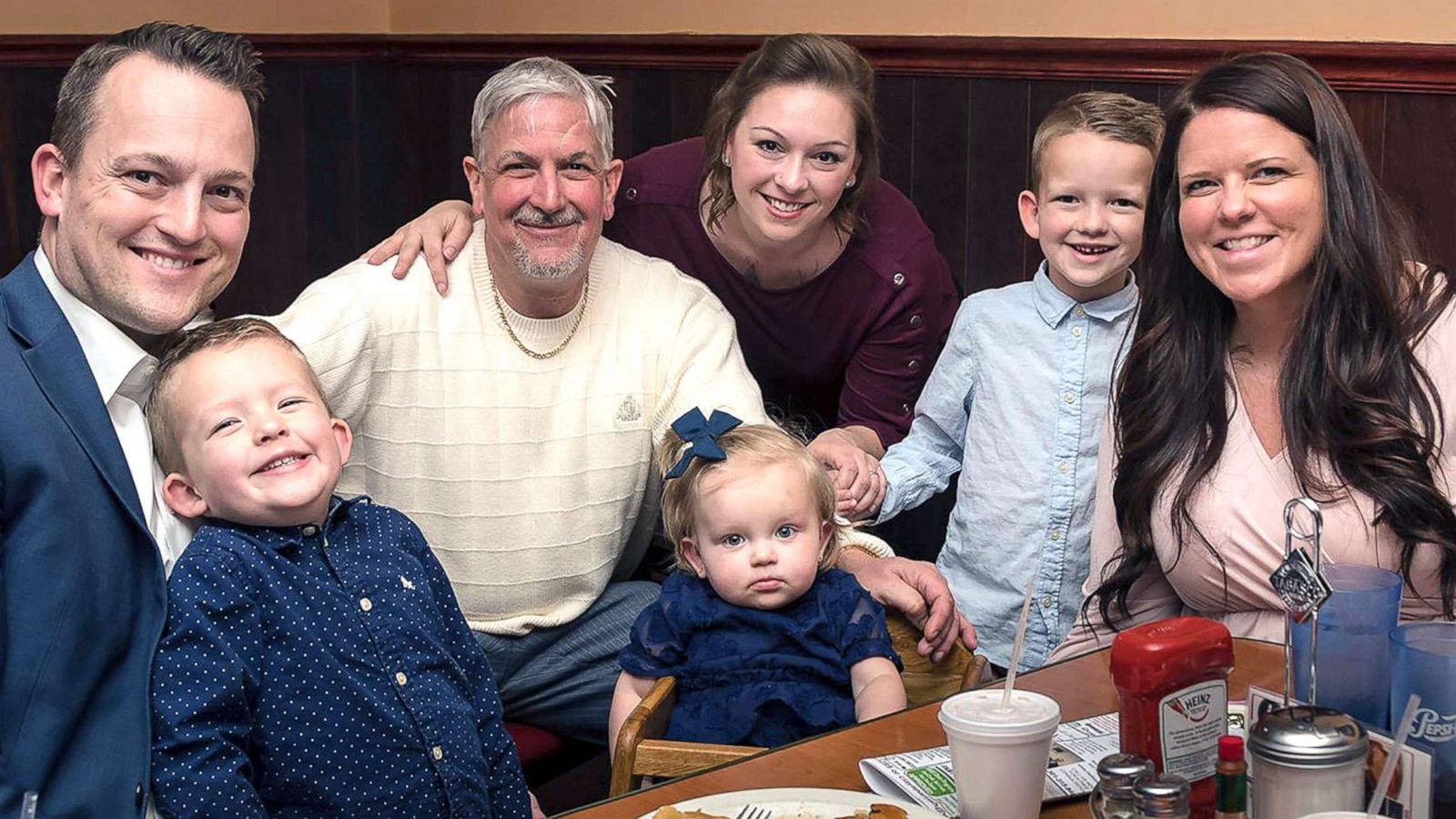 PHOTO: Transplant recipient David Bennett, Sr., center in white, poses with family members in a 2019 photo.