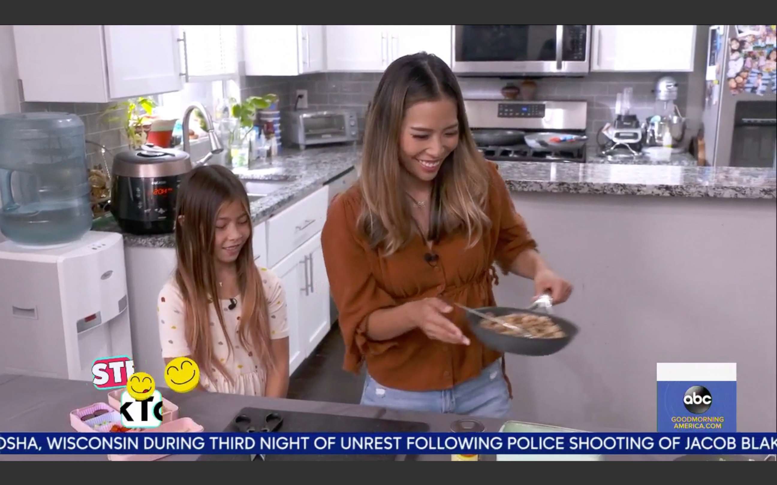 PHOTO: Jessica Woo and her daughter Adeline create a fried rice bento box on"GMA."