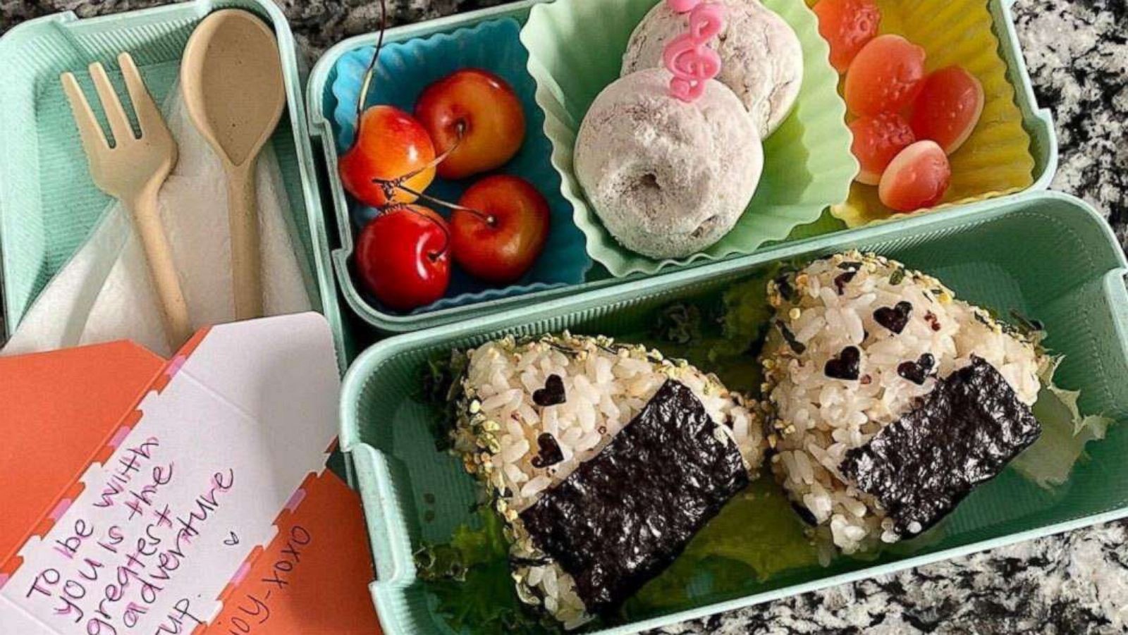 PHOTO: Jessica Woo's creative tuna onigiri bento box served for her kids with a note.