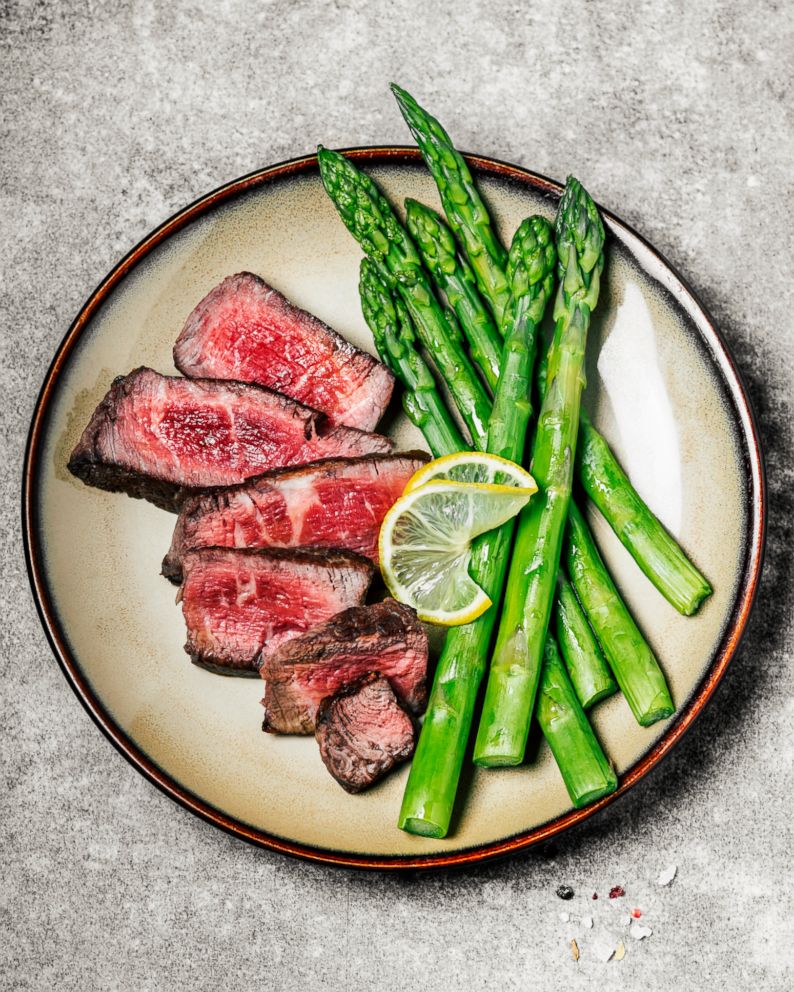 PHOTO: Sliced steak with asparagus is pictured in this undated stock photo.