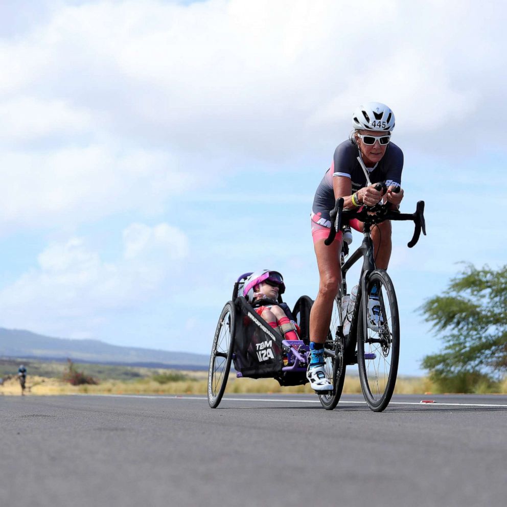 VIDEO: Mom competes in 140-mile race with daughter who’s unable to walk 