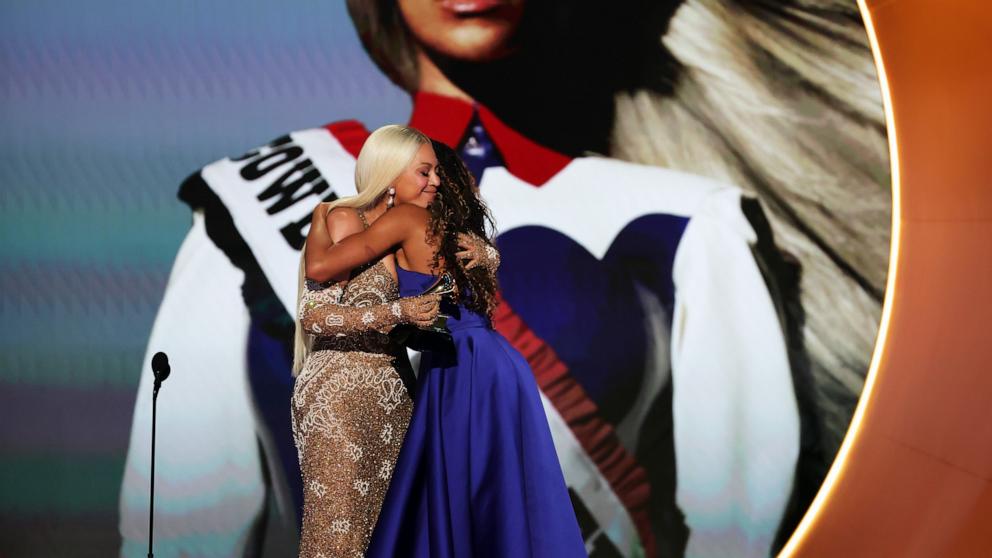 PHOTO:Beyonce accepts the Album of the Year award for "COWBOY CARTER" with Blue Ivy Carter onstage during the 67th Annual GRAMMY Awards on Feb. 02, 2025 in Los Angeles.