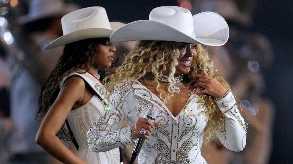 PHOTO: Beyonce performs with her daughter Blue Ivy during the halftime show of an NFL football game between the Houston Texans and the Baltimore Ravens, Dec. 25, 2024, in Houston.