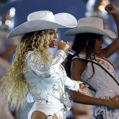 PHOTO: Beyonce performs with daughter, Blue Ivy, during the halftime show for the game between the Baltimore Ravens and the Houston Texans at NRG Stadium on December 25, 2024 in Houston, Texas.