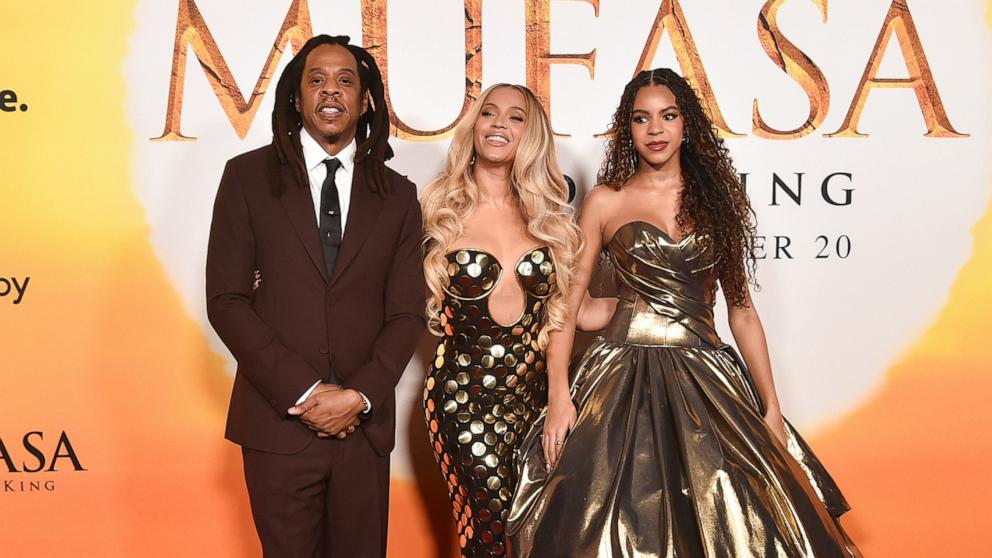 PHOTO: Jay-Z, from left, Beyoncé and Blue Ivy Carter arrive at the premiere of "Mufasa: The Lion King," Dec. 9, 2024, at the Dolby Theatre in Los Angeles.