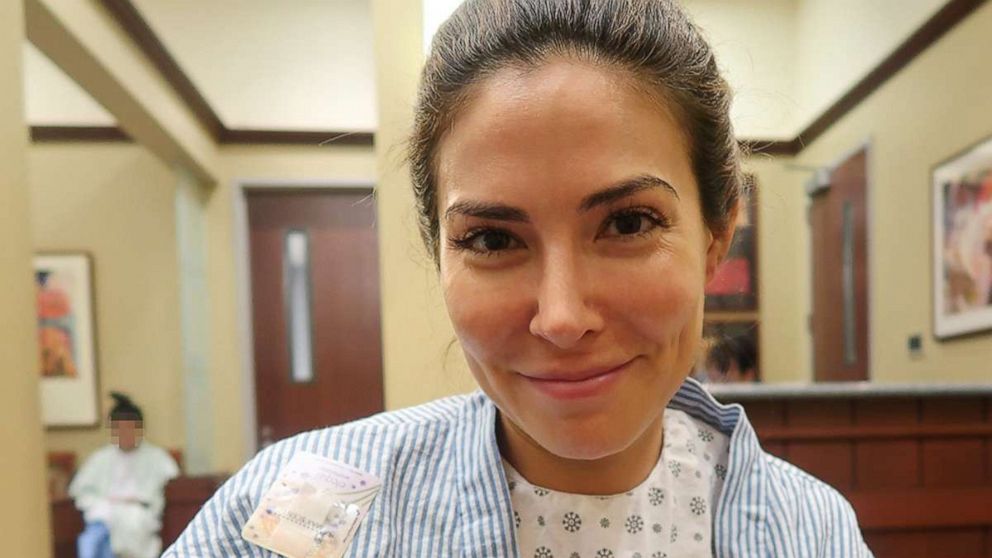 PHOTO: Bianca Jade, of New York City, is photographed in a hospital gown while undergoing egg freezing.