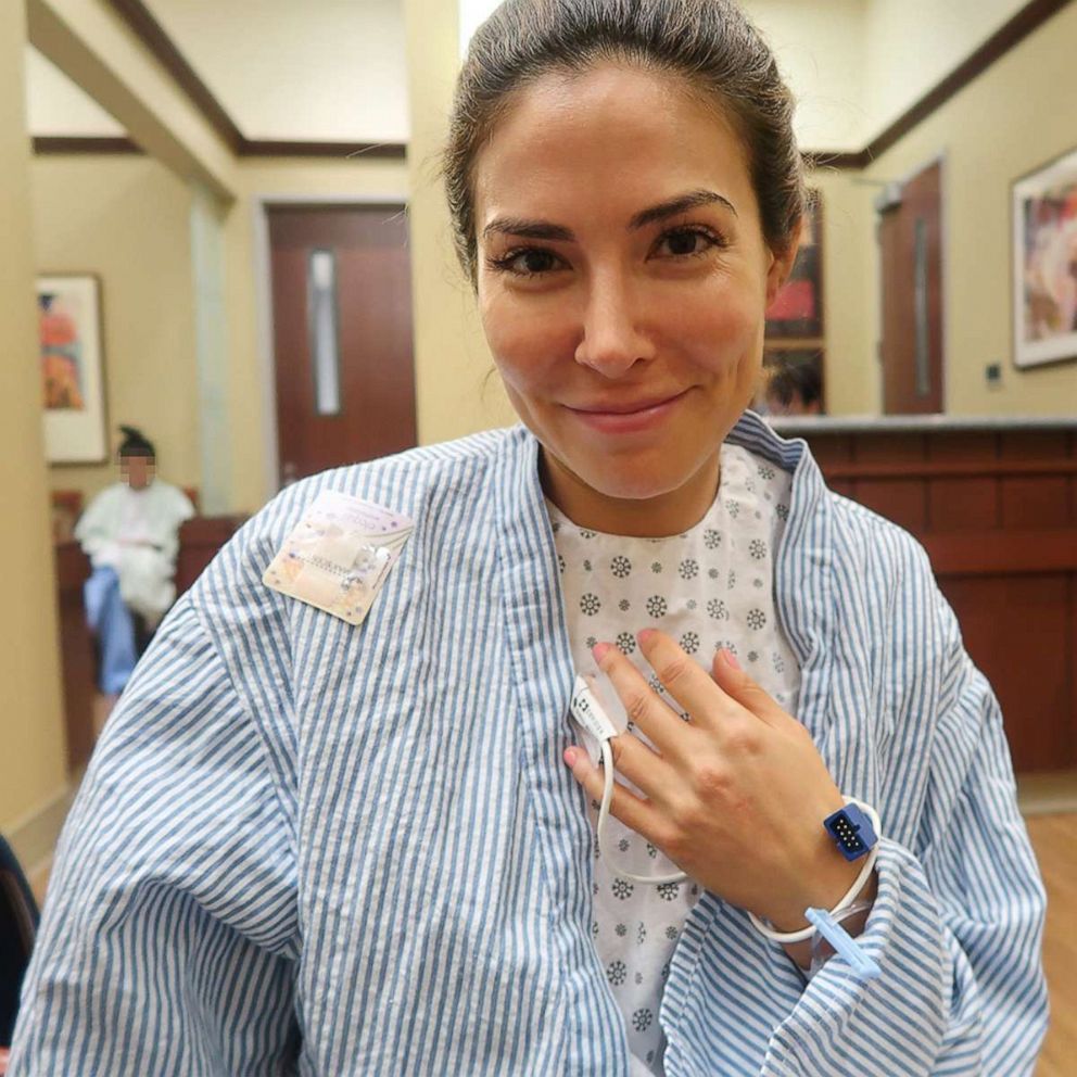 PHOTO: Bianca Jade, of New York City, is photographed in a hospital gown while undergoing egg freezing.