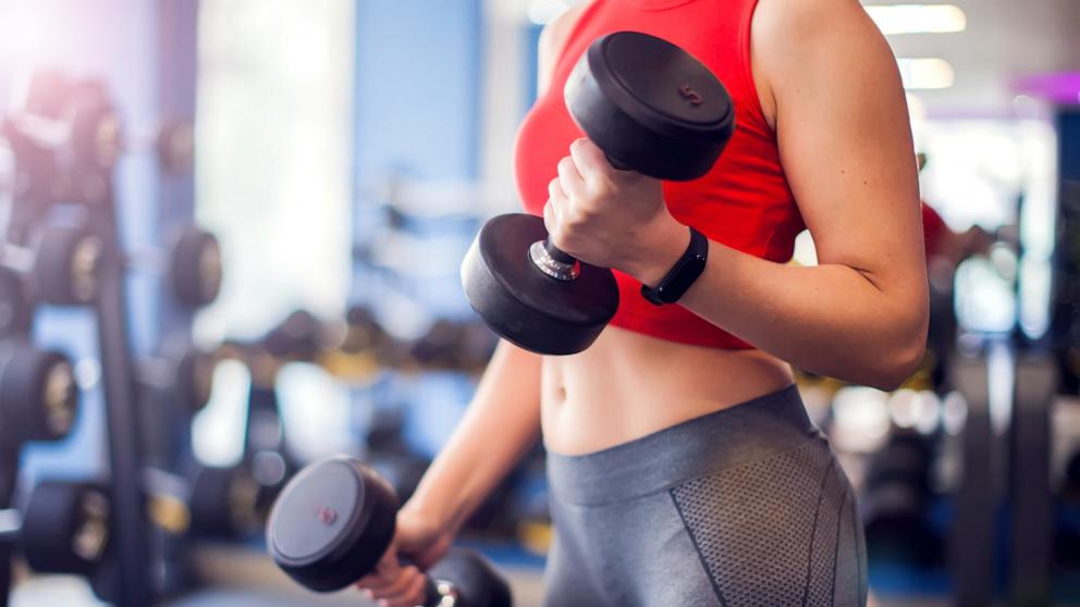 PHOTO: A woman does a bicep curl in an undated stock photo. 