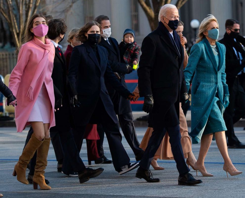 PHOTO: President Joe Biden, first lady Jill Biden and their family walk the abbreviated parade route after Biden's inauguration on Jan. 20, 2021, in Washington, D.C.