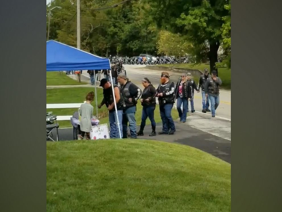 PHOTO: The Milwaukee Iron motorcycle group of Kokomo, Indiana, lined up at 8-year-old Bryannes stand after her mom Daryn Sturch, a nurse, helped them after a highway crash.
