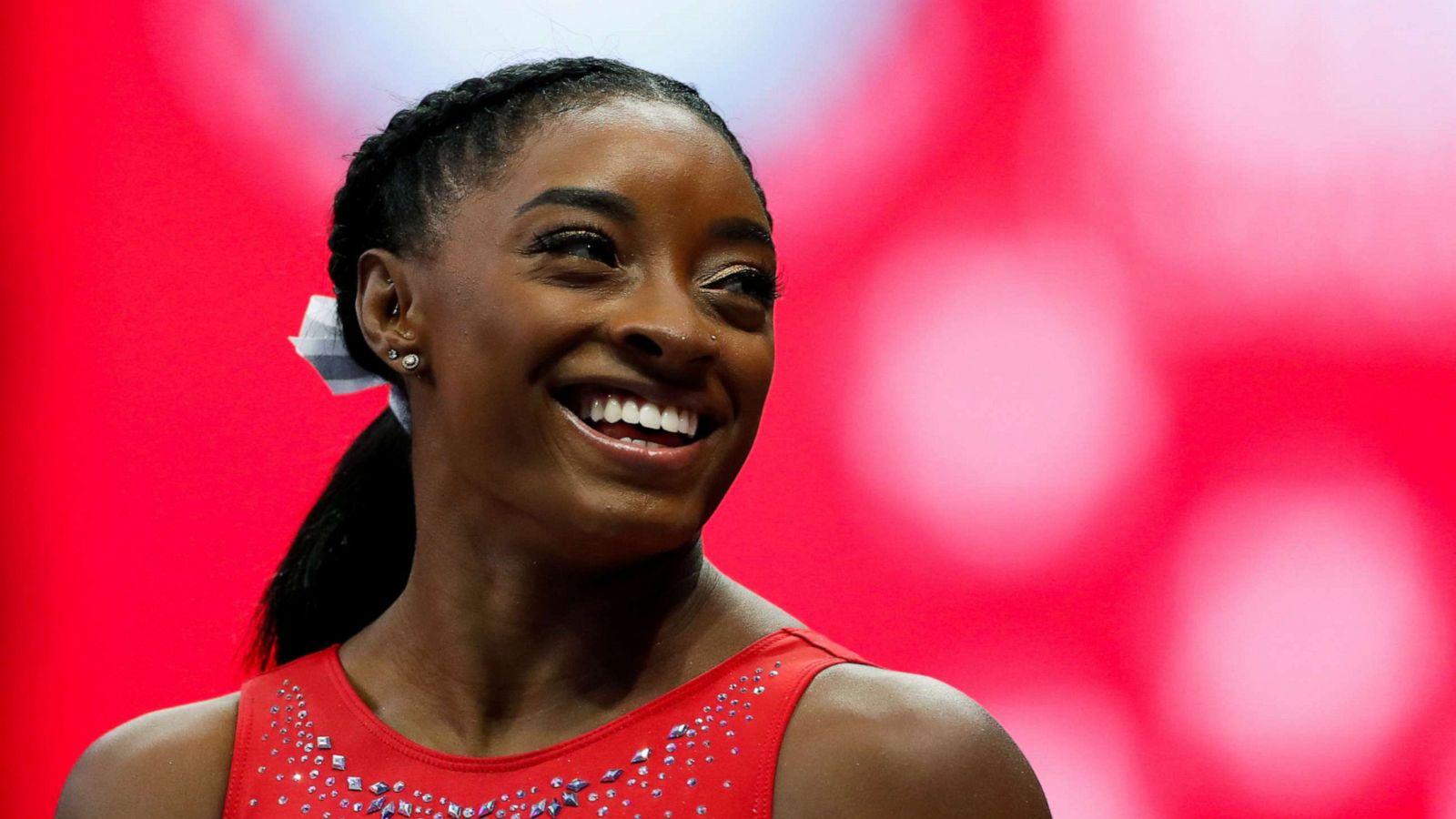 PHOTO: Simone Biles smiles at a teammate during the final day of the U.S. Olympic Team Trials for gymnastics in St. Louis, Missouri, June 27, 2021.