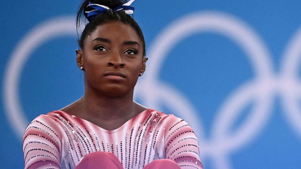 PHOTO: Gymnast Simone Biles waits during competition at the Tokyo Olympic Games, Aug. 3, 2021, in Tokyo. 