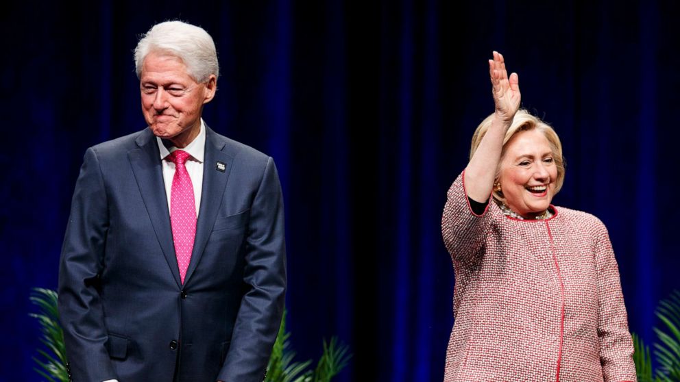 PHOTO: Former President Bill Clinton and former Secretary of State and presidential candidate Hillary Clinton on stage at Rogers Arena on May 02, 2019, in Vancouver, Canada