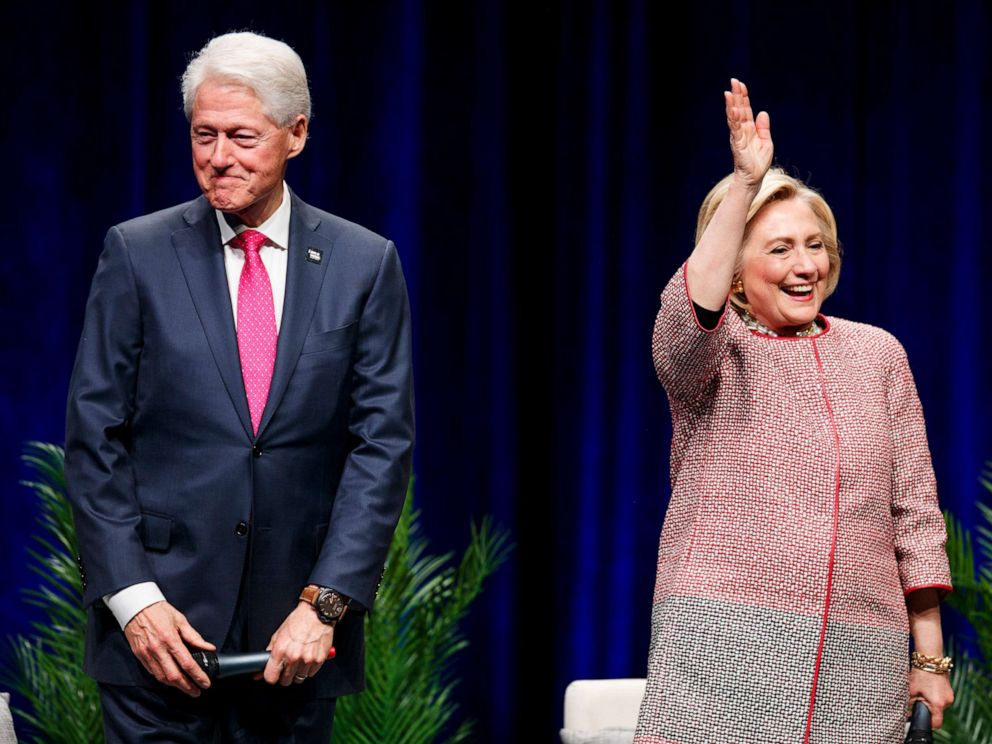 PHOTO: Former President Bill Clinton and former Secretary of State and presidential candidate Hillary Clinton on stage at Rogers Arena on May 02, 2019, in Vancouver, Canada